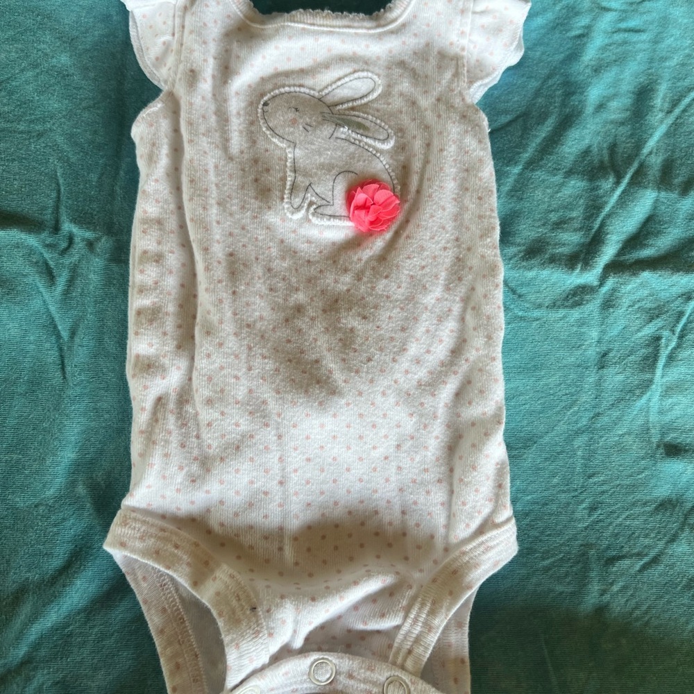 Entire bin of infant/toddler clothes.